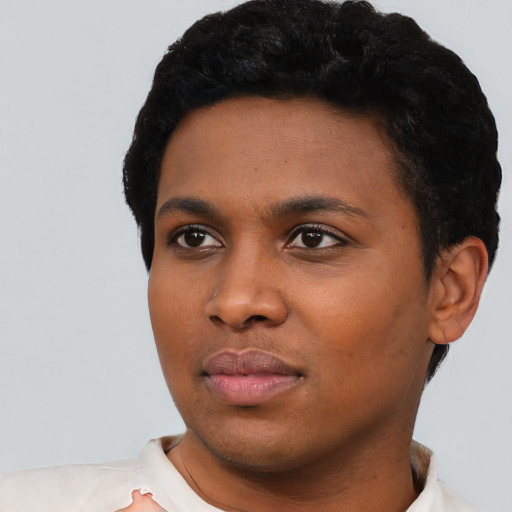 Neutral black young-adult female with short  black hair and brown eyes