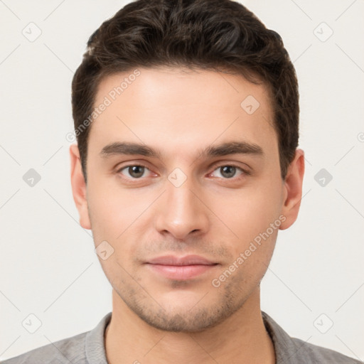 Neutral white young-adult male with short  brown hair and brown eyes