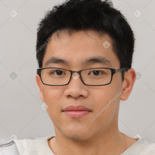 Neutral asian young-adult male with short  black hair and brown eyes