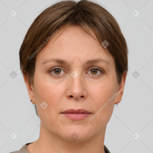 Joyful white adult female with short  brown hair and grey eyes