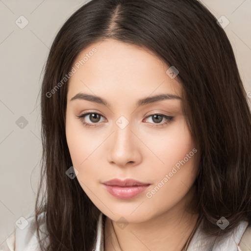 Neutral white young-adult female with long  brown hair and brown eyes