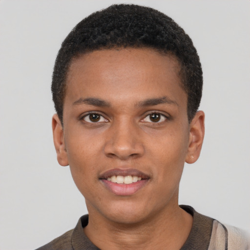 Joyful black young-adult male with short  brown hair and brown eyes