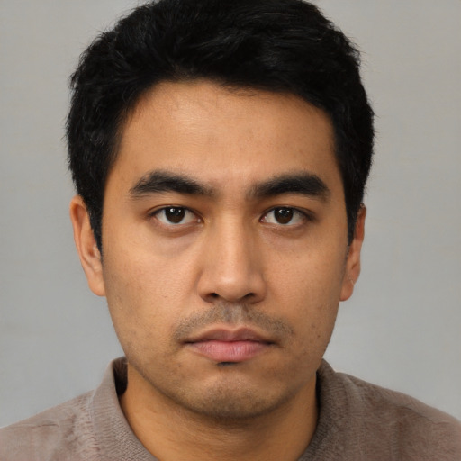 Neutral asian young-adult male with short  black hair and brown eyes