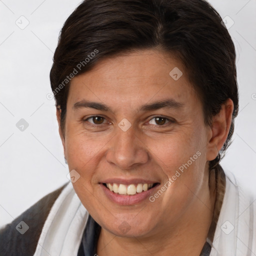 Joyful white adult female with short  brown hair and brown eyes