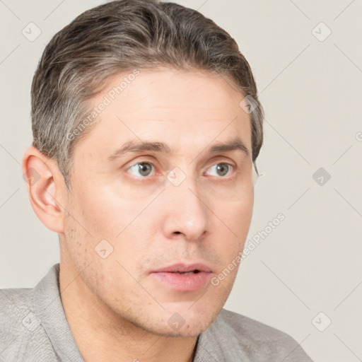 Neutral white adult male with short  brown hair and brown eyes