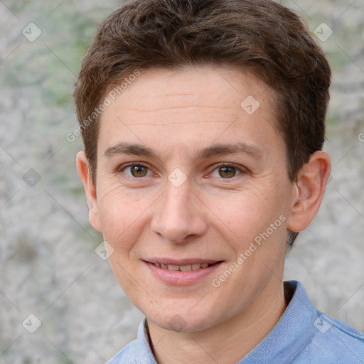 Joyful white adult male with short  brown hair and grey eyes