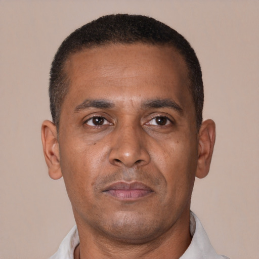 Neutral black adult male with short  brown hair and brown eyes