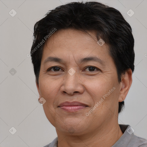 Joyful white adult female with short  brown hair and brown eyes