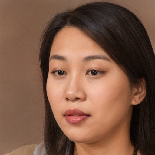 Neutral asian young-adult female with long  brown hair and brown eyes