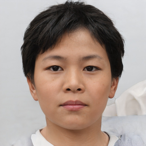 Neutral asian child female with short  brown hair and brown eyes