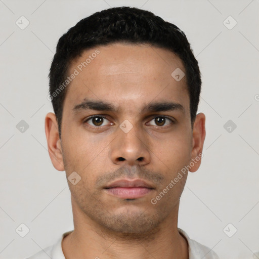 Neutral latino young-adult male with short  black hair and brown eyes