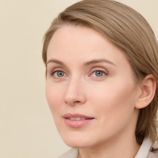 Neutral white young-adult female with medium  brown hair and blue eyes