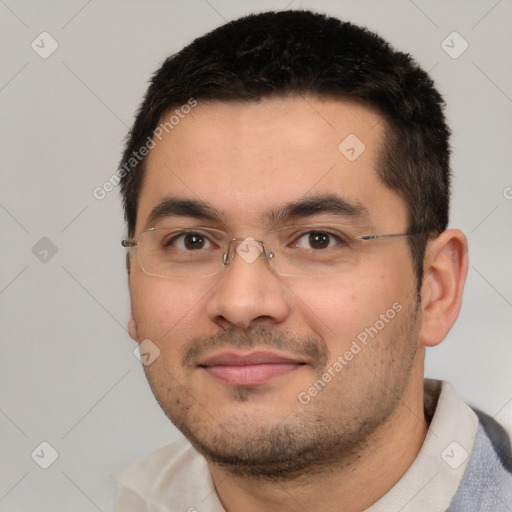 Joyful white young-adult male with short  black hair and brown eyes