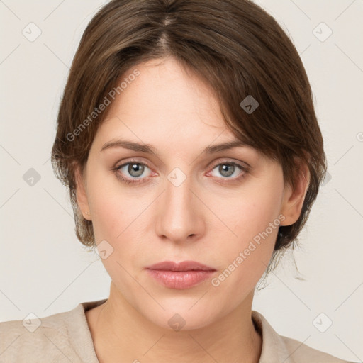 Neutral white young-adult female with medium  brown hair and grey eyes