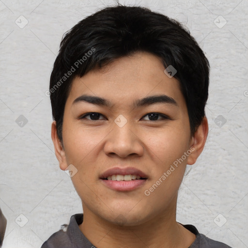 Joyful asian young-adult male with short  black hair and brown eyes