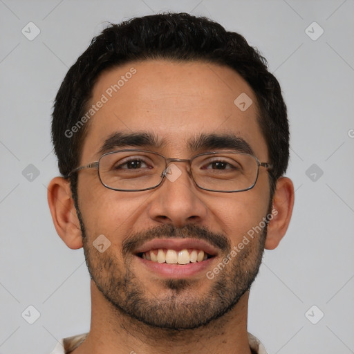 Joyful white young-adult male with short  black hair and brown eyes