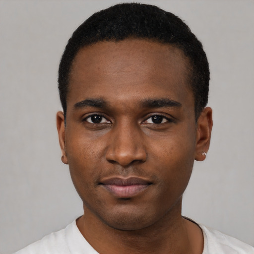 Neutral black young-adult male with short  black hair and brown eyes