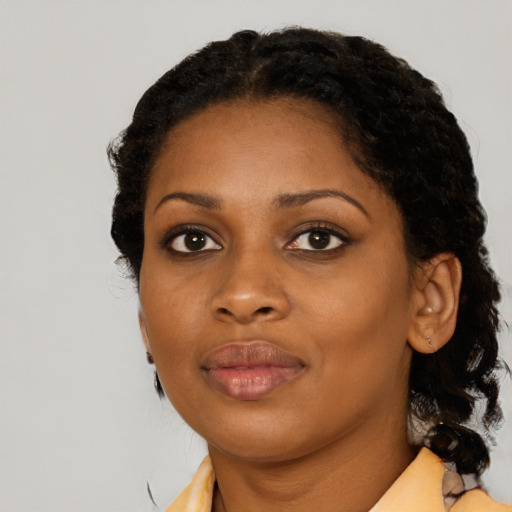 Neutral black young-adult female with medium  black hair and brown eyes