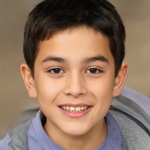 Joyful white child male with short  brown hair and brown eyes