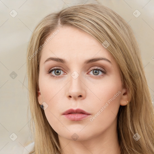 Neutral white young-adult female with long  brown hair and grey eyes