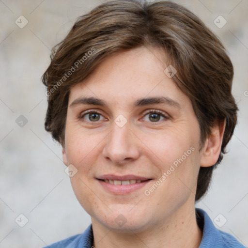 Joyful white adult female with short  brown hair and grey eyes