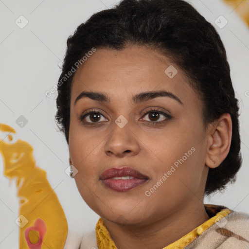 Joyful latino young-adult female with short  brown hair and brown eyes