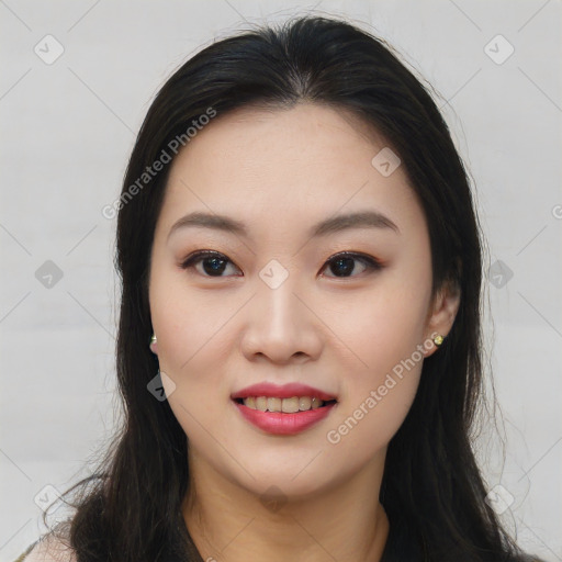 Joyful asian young-adult female with long  brown hair and brown eyes