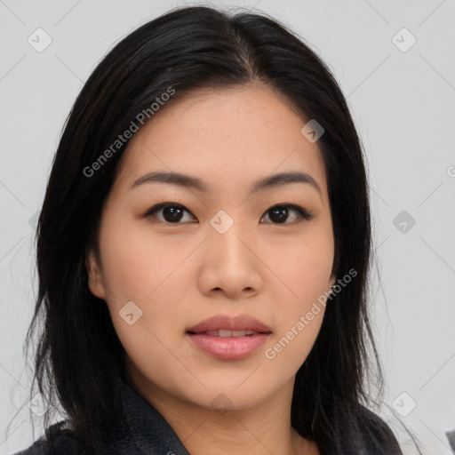 Joyful asian young-adult female with medium  black hair and brown eyes