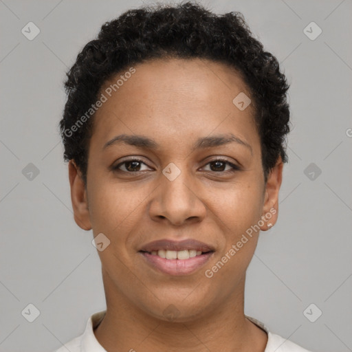 Joyful latino young-adult female with short  black hair and brown eyes