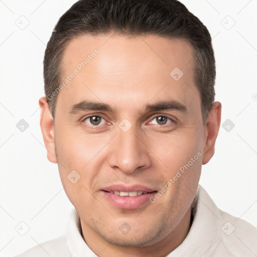 Joyful white young-adult male with short  brown hair and brown eyes