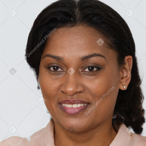 Joyful latino adult female with medium  brown hair and brown eyes