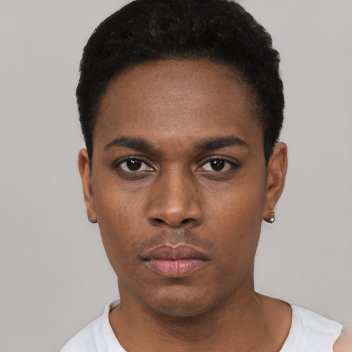 Neutral black young-adult male with short  black hair and brown eyes