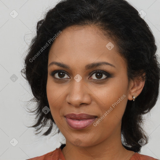 Joyful black young-adult female with medium  brown hair and brown eyes