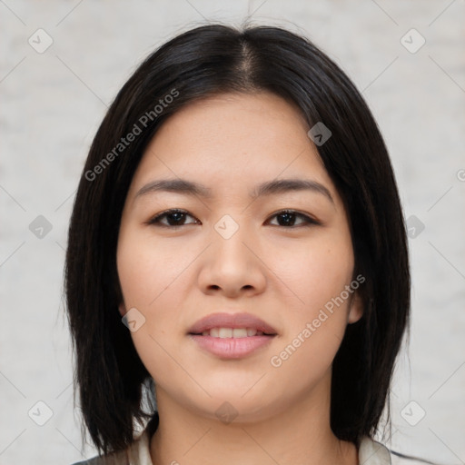 Joyful asian young-adult female with medium  black hair and brown eyes