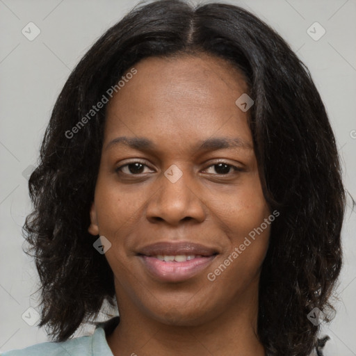 Joyful black young-adult female with medium  brown hair and brown eyes