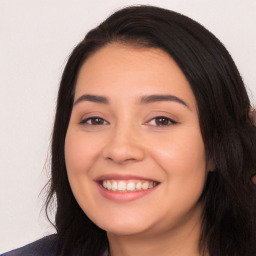 Joyful white young-adult female with long  black hair and brown eyes