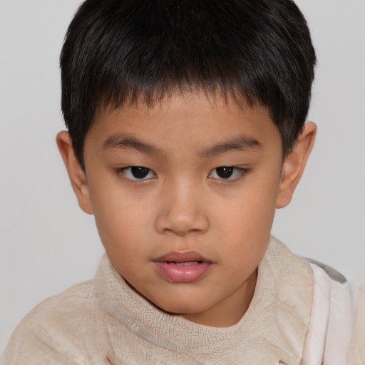 Neutral asian child male with short  brown hair and brown eyes