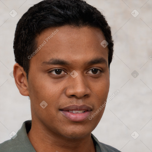 Joyful black young-adult male with short  brown hair and brown eyes