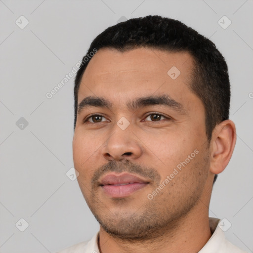 Neutral latino young-adult male with short  black hair and brown eyes