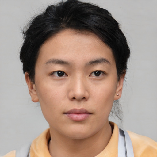 Neutral asian young-adult female with short  brown hair and brown eyes