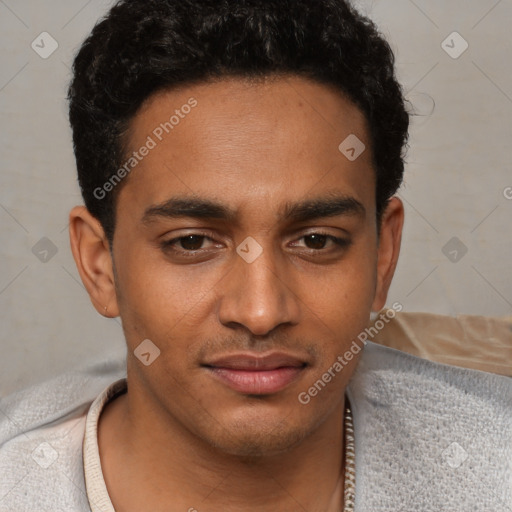 Joyful latino young-adult male with short  brown hair and brown eyes