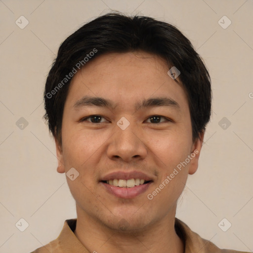 Joyful asian young-adult male with short  black hair and brown eyes