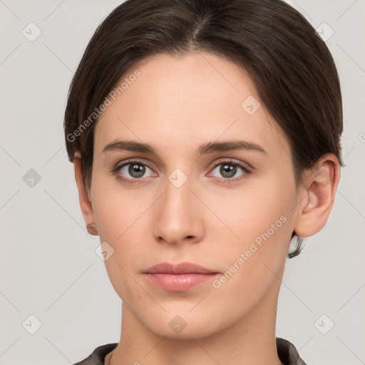 Neutral white young-adult female with short  brown hair and brown eyes