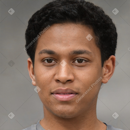 Joyful latino young-adult male with short  brown hair and brown eyes