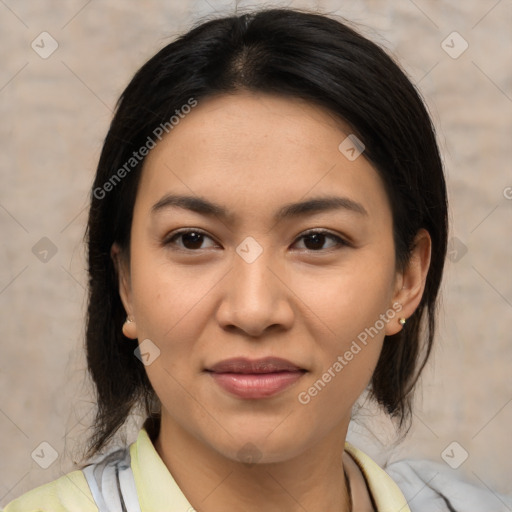 Joyful asian young-adult female with medium  brown hair and brown eyes