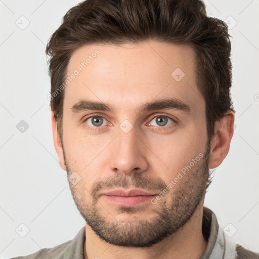 Neutral white young-adult male with short  brown hair and brown eyes