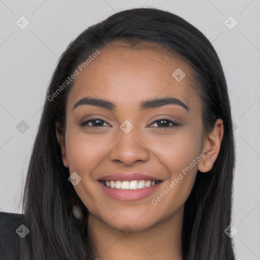 Joyful latino young-adult female with long  black hair and brown eyes