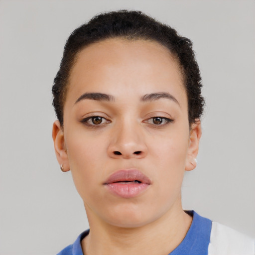 Neutral black young-adult female with short  brown hair and brown eyes