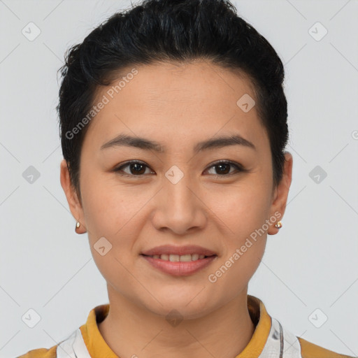 Joyful latino young-adult female with short  brown hair and brown eyes