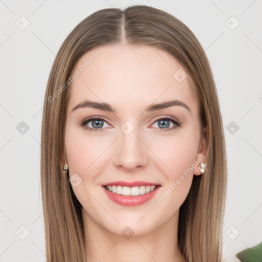 Joyful white young-adult female with long  brown hair and green eyes